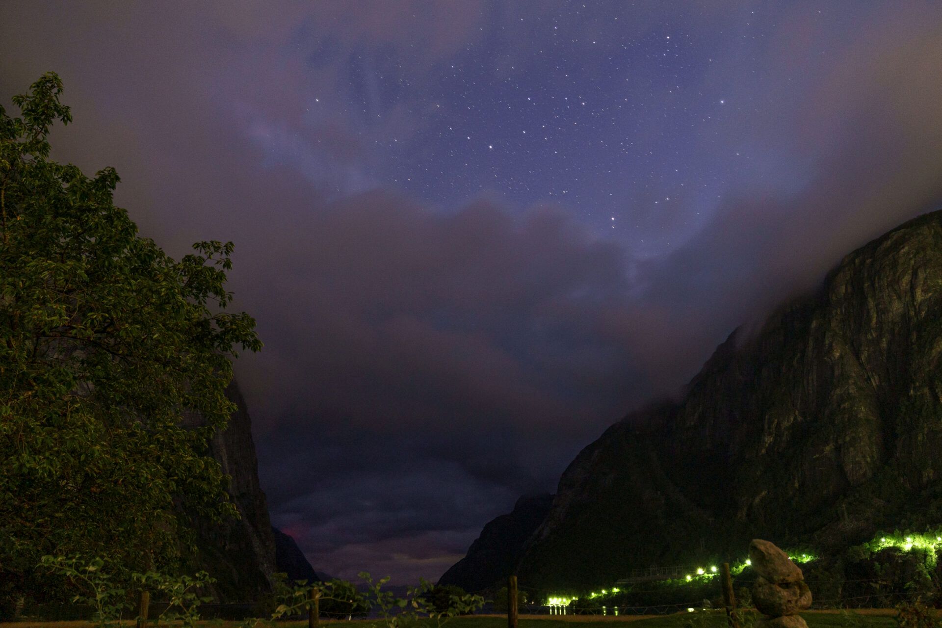 Cosmic clouds at night between fiords